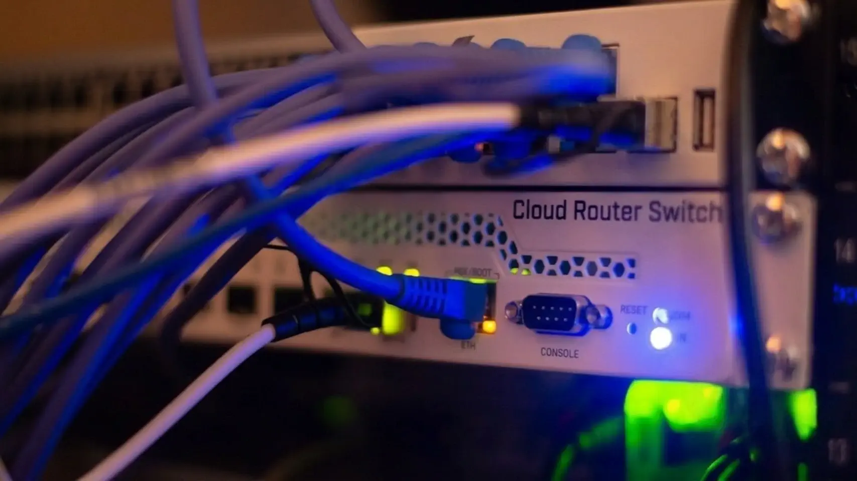 Network switch with fiber optic and copper cables connected